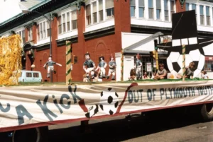 Archival photo of PYSA at a parade in the 1970s